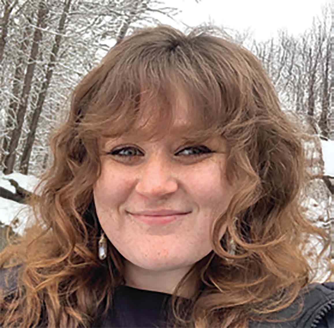 Professional headshot of Josie Woodman, Content & Publication Coordinator at Team Muskoka